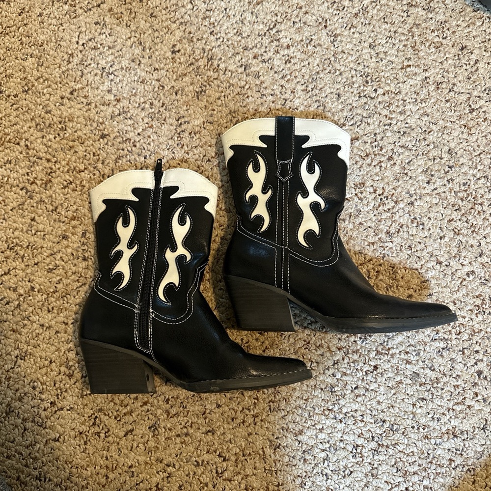 Black cowboy boots with white detailing